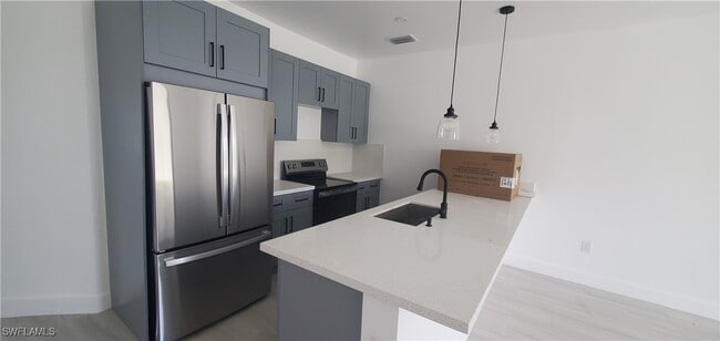 122 Gretchen Ave S in Lehigh Acres, FL - Building Photo - Building Photo