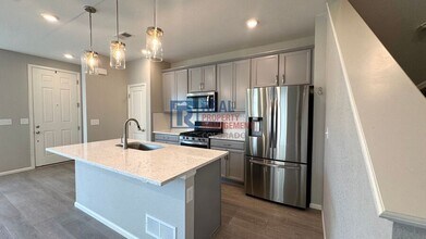 21371 E 60th Ave in Aurora, CO - Building Photo - Building Photo