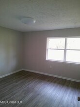 433 Meadowlark Dr, Unit 7 in Canton, MS - Foto de edificio - Building Photo