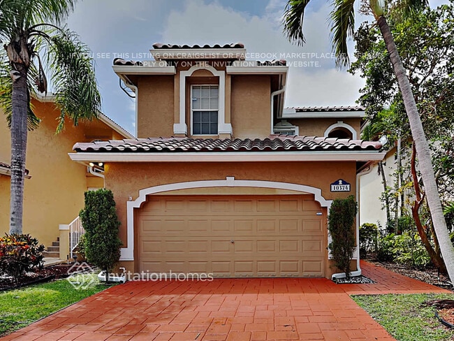 property at 10374 NW 7th St