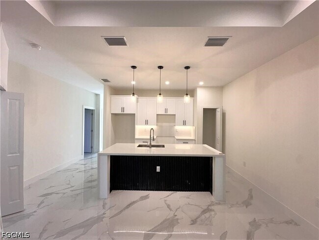 2404 Dickens Ave N in Lehigh Acres, FL - Building Photo - Building Photo