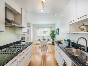 1410 S Bentley Ave, Unit 104 in Los Angeles, CA - Building Photo - Building Photo