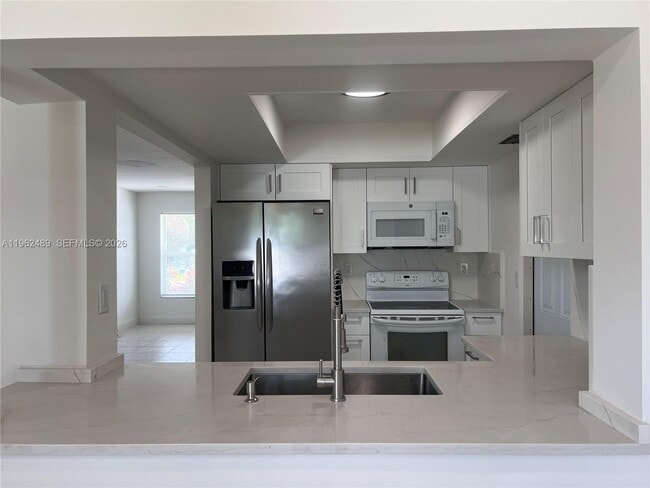 7313 NW 57th Ct in Tamarac, FL - Building Photo - Building Photo