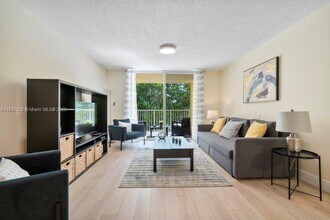 19999 E Country Club Dr, Unit 1206 in Aventura, FL - Building Photo - Building Photo