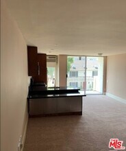 6151 Orange St-Unit -221 in Los Angeles, CA - Building Photo - Building Photo