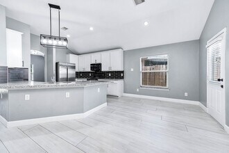 5006 Riverbridge Ct in Spring, TX - Building Photo - Building Photo