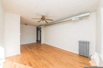 1251 W Henderson St, Unit 1 in Chicago, IL - Building Photo - Building Photo