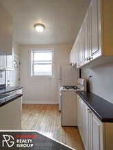 540 W Aldine Ave, Unit 560-1N in Chicago, IL - Foto de edificio - Building Photo