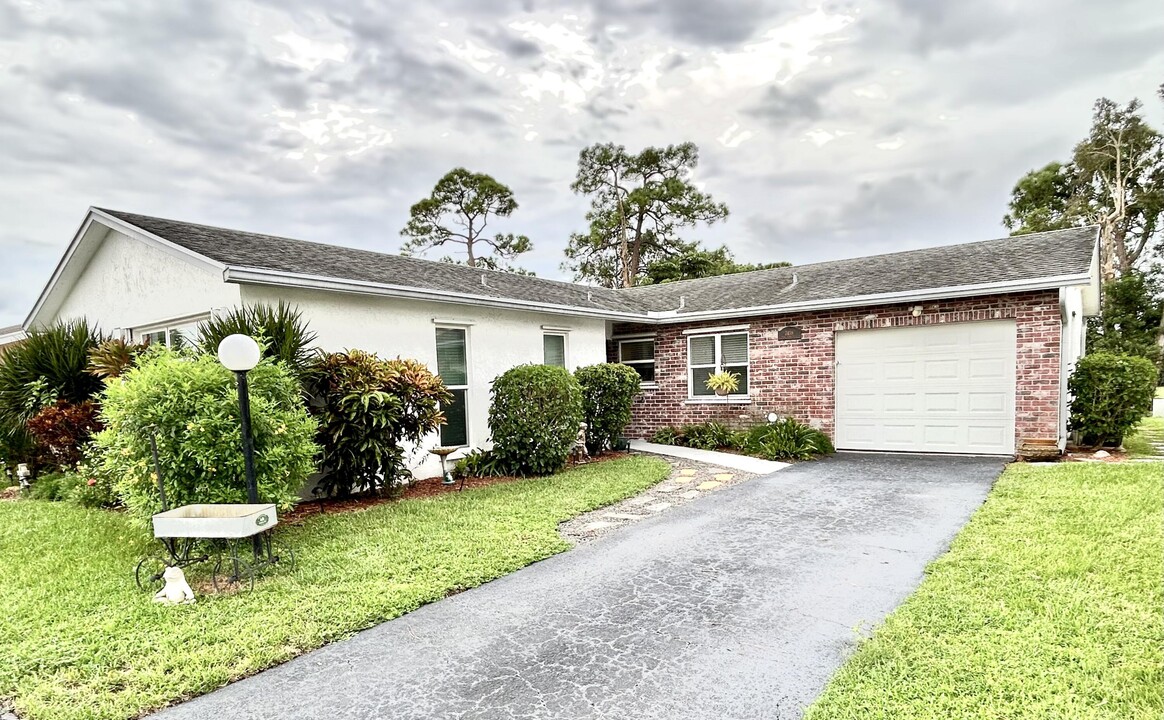 7438 Pine Park Dr S in Greenacres, FL - Building Photo