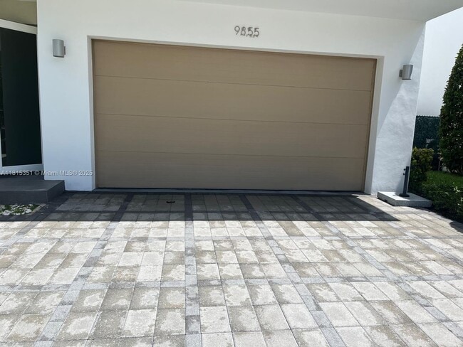 property at 9855 NW 75th Terrace