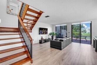 9931 Costa del Sol Blvd, Unit F-107 in Doral, FL - Building Photo - Building Photo