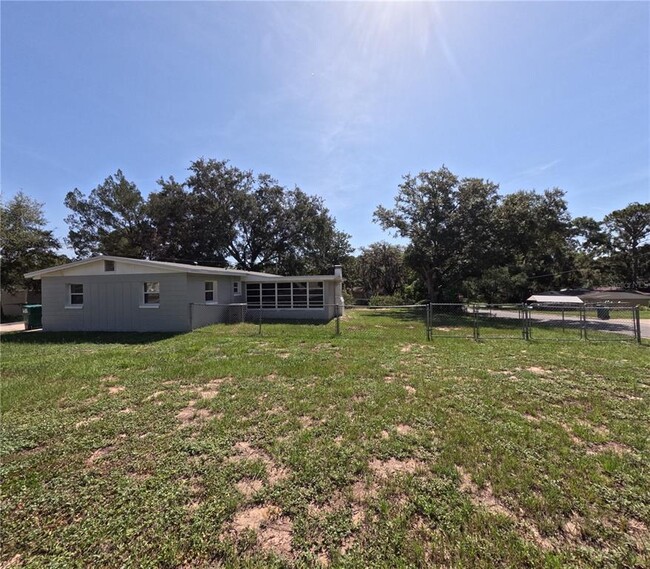 property at 809 Plumosa Ave