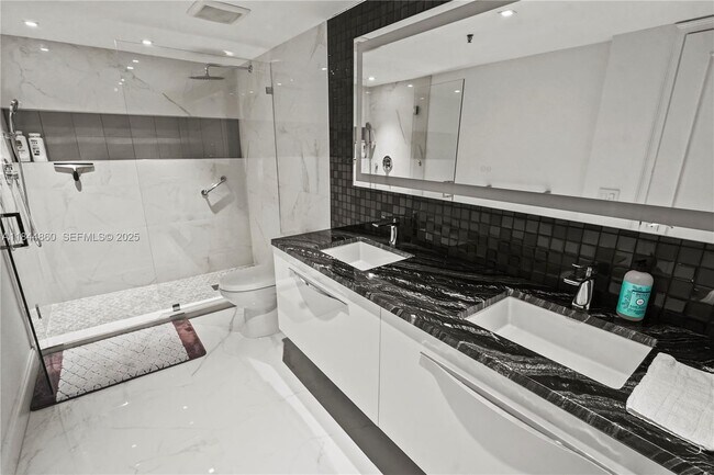 property at 8877 Collins Ave