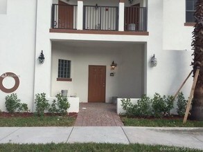 10600 NW 88th St-Unit -1A0 in Doral, FL - Building Photo - Building Photo