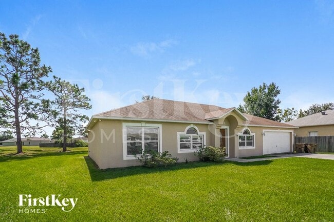 129 Aurora Ln in Kissimmee, FL - Foto de edificio - Building Photo