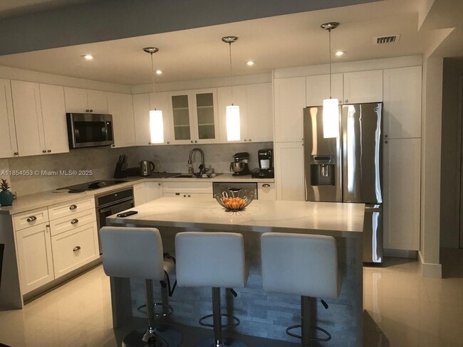 property at 19390 Collins Ave