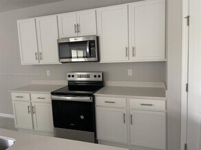 429 NE Juanita Pl in Cape Coral, FL - Building Photo - Building Photo
