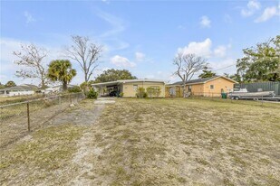 130 Indian Creek Rd, Unit D-D-205 in Oak Hill, FL - Building Photo