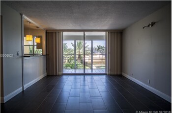 100 Golden Isles Dr-Unit -301 in Hallandale Beach, FL - Building Photo