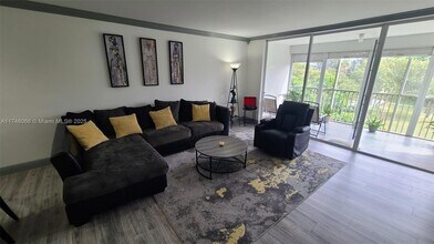2650 S Course Dr, Unit # 401 in Pompano Beach, FL - Building Photo - Building Photo
