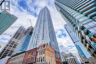 1 Yorkville Ave in Toronto, ON - Building Photo
