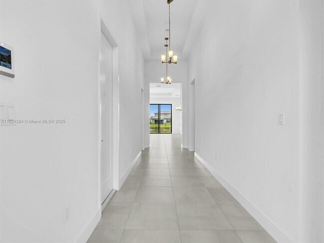 10032 Stockrun Dr in Palm Beach Gardens, FL - Building Photo - Building Photo