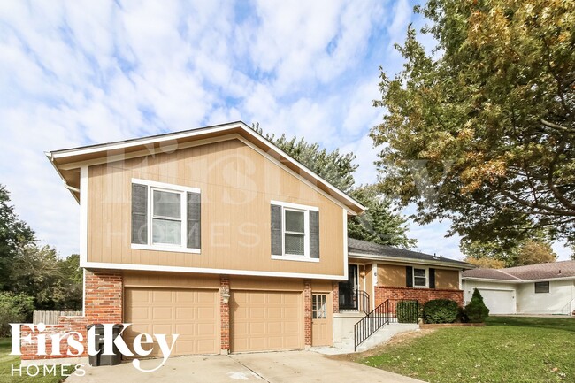 303 Monroe Ave in Belton, MO - Foto de edificio - Building Photo