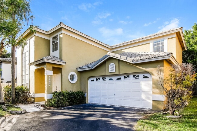 property at 5477 NW 44th Way