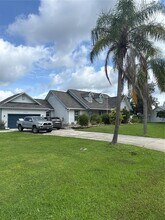 12586 Proctor Ave in Port Charlotte, FL - Building Photo - Building Photo