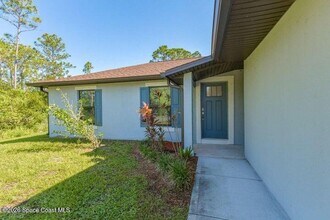1677 Lizette St SE in Palm Bay, FL - Building Photo - Building Photo