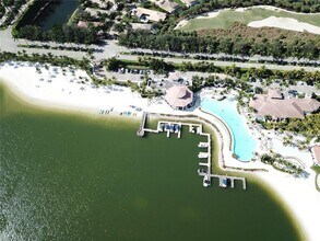 10050 Valiant Ct-Unit -201 in Miromar Lakes, FL - Building Photo - Building Photo