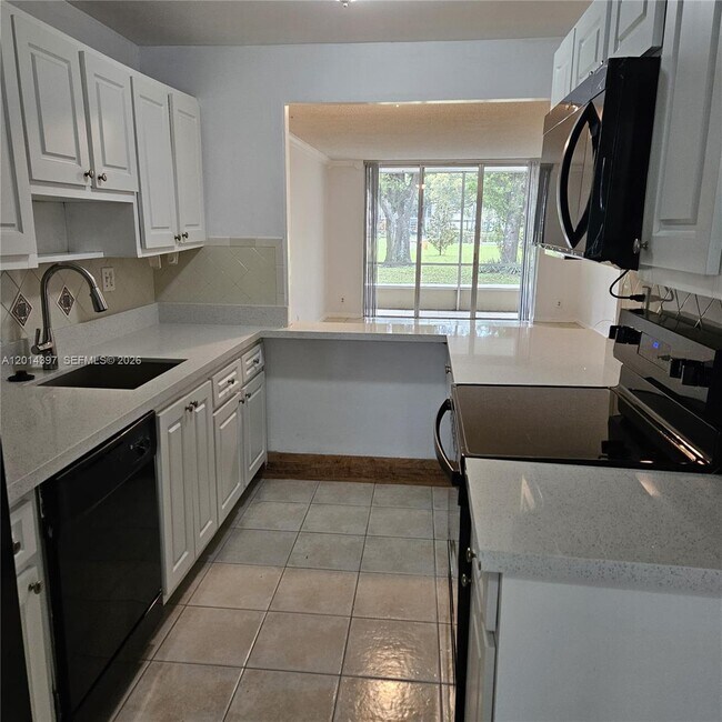 3070 NW 48th Terrace in Lauderdale Lakes, FL - Building Photo - Building Photo