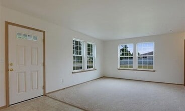 Bright Everett Home with 2-Car Garage in Everett, WA - Building Photo - Building Photo