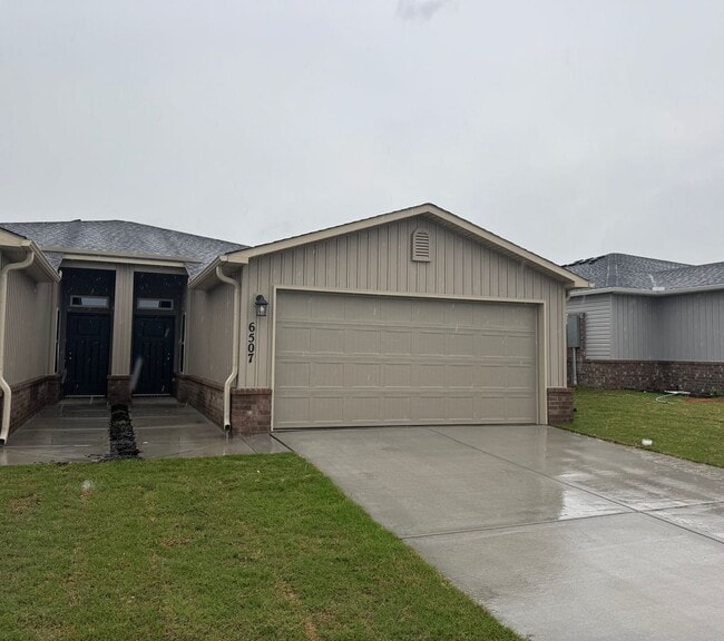property at 6507 NW Vandergriff St