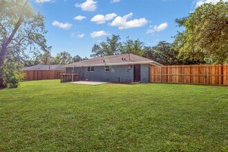 1418 N Roberson St in Conroe, TX - Building Photo - Building Photo