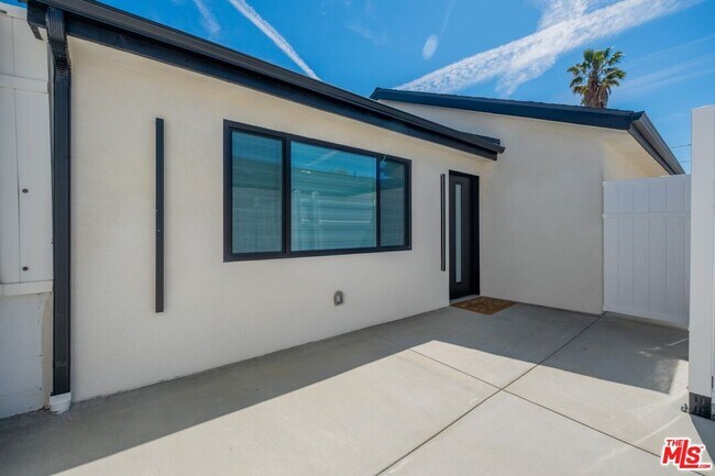 property at 7028 Stansbury Ave