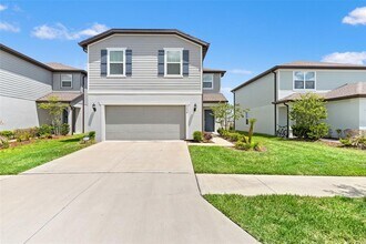9058 Rally Spring Lp in Wesley Chapel, FL - Building Photo - Building Photo