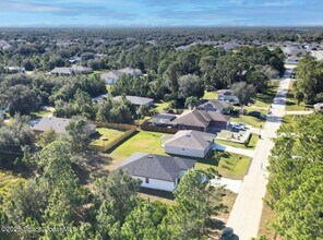 410 Flat River St SW in Palm Bay, FL - Building Photo - Building Photo