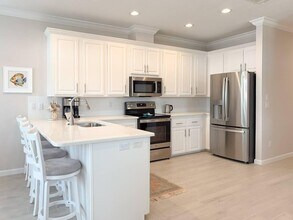 389 NE Sand Dune Way in Ocean Breeze, FL - Building Photo - Building Photo