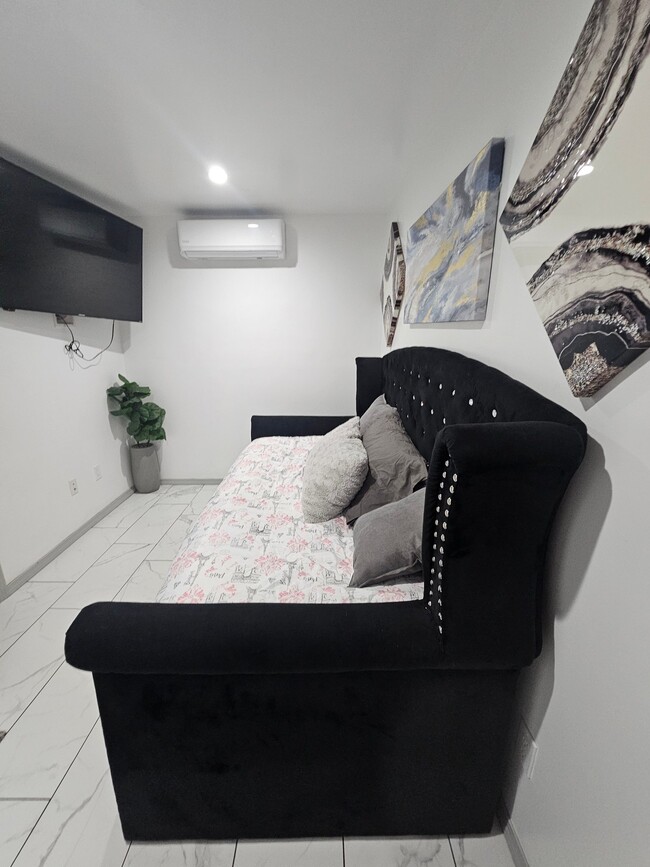 property at 124 E 135th St