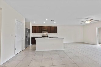 15484 Wildflower Cir in Naples, FL - Foto de edificio - Building Photo