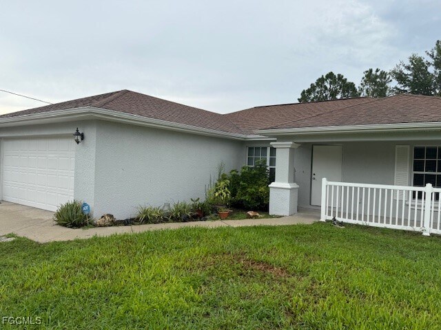 1013 Belmont St E in Lehigh Acres, FL - Building Photo - Building Photo