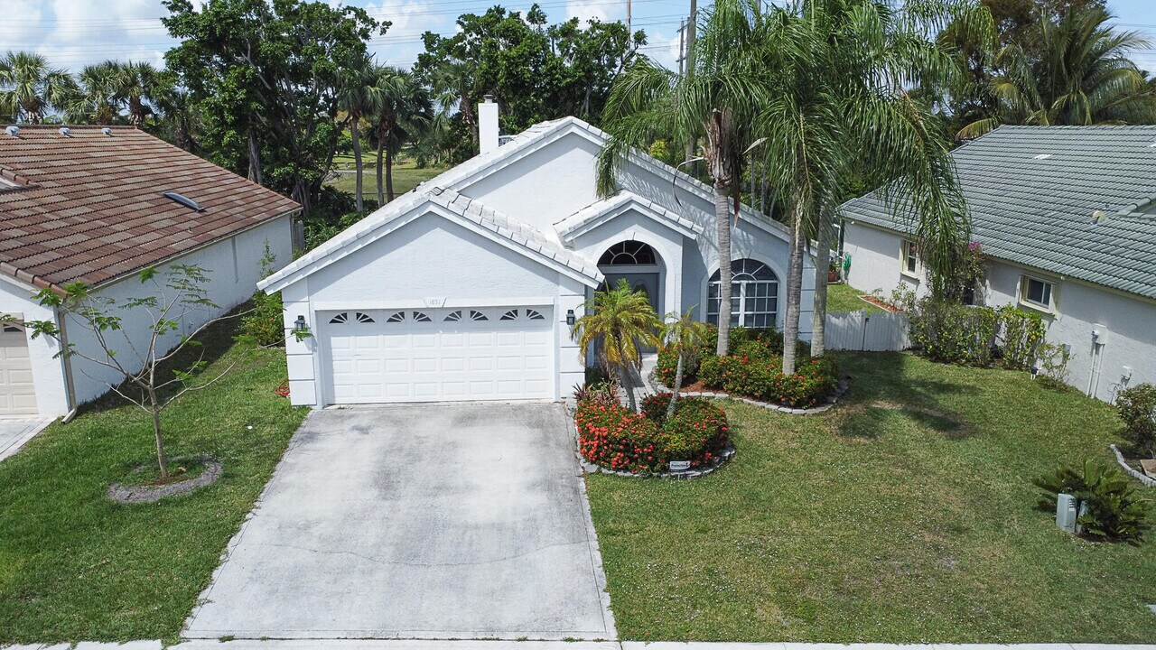 1851 Oak Berry Cir in Wellington, FL - Building Photo