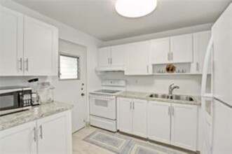 2307 S Cypress Bend Dr, Unit 309A in Pompano Beach, FL - Building Photo - Building Photo