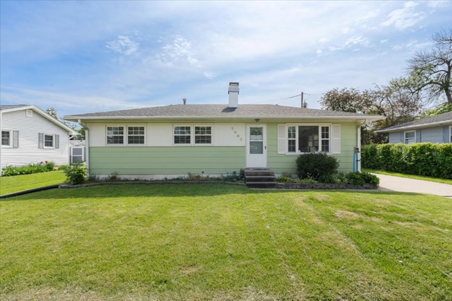 property at 7907-8 1/2 8 1/2 St W