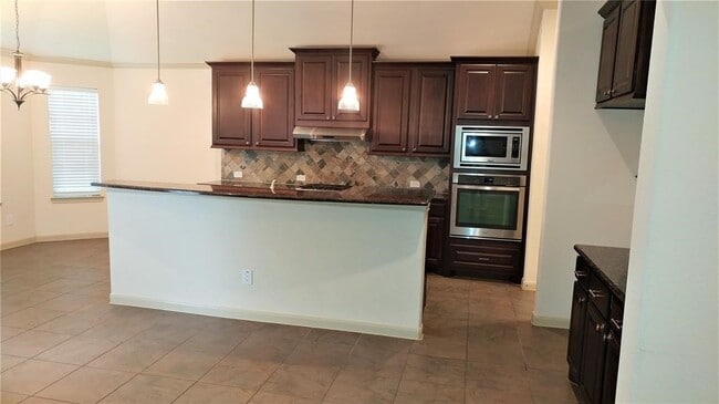 property at 11010 Sir Alex Dr