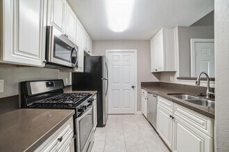 7885 W Flamingo Rd in Las Vegas, NV - Building Photo - Building Photo