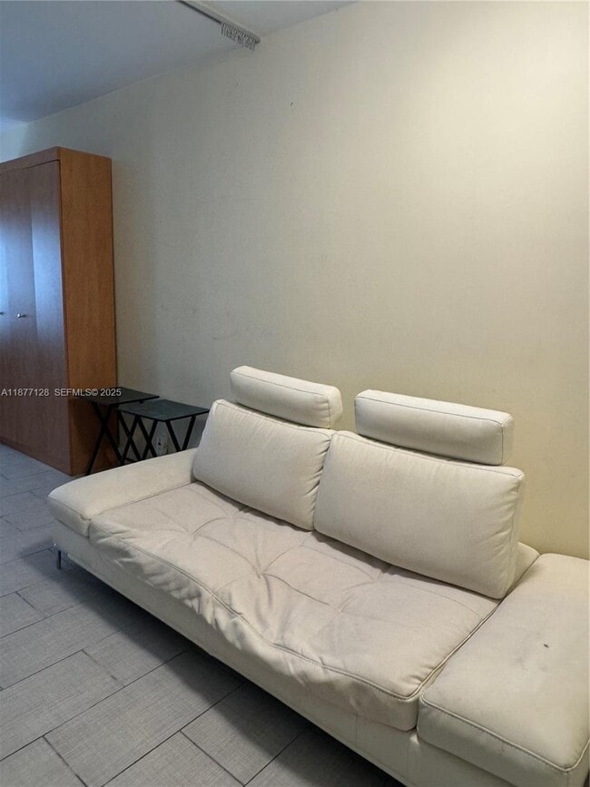 property at 6494 Collins Ave