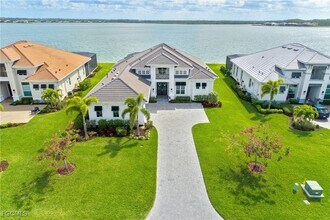 19053 WildBlue Blvd in Miromar Lakes, FL - Building Photo - Building Photo