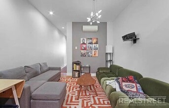 Spacious 3BR Apartment in Prime Bushwick | Skylight, Laundry, Courtyard | No Fee, Unit 1L in Brooklyn, NY - Building Photo - Building Photo